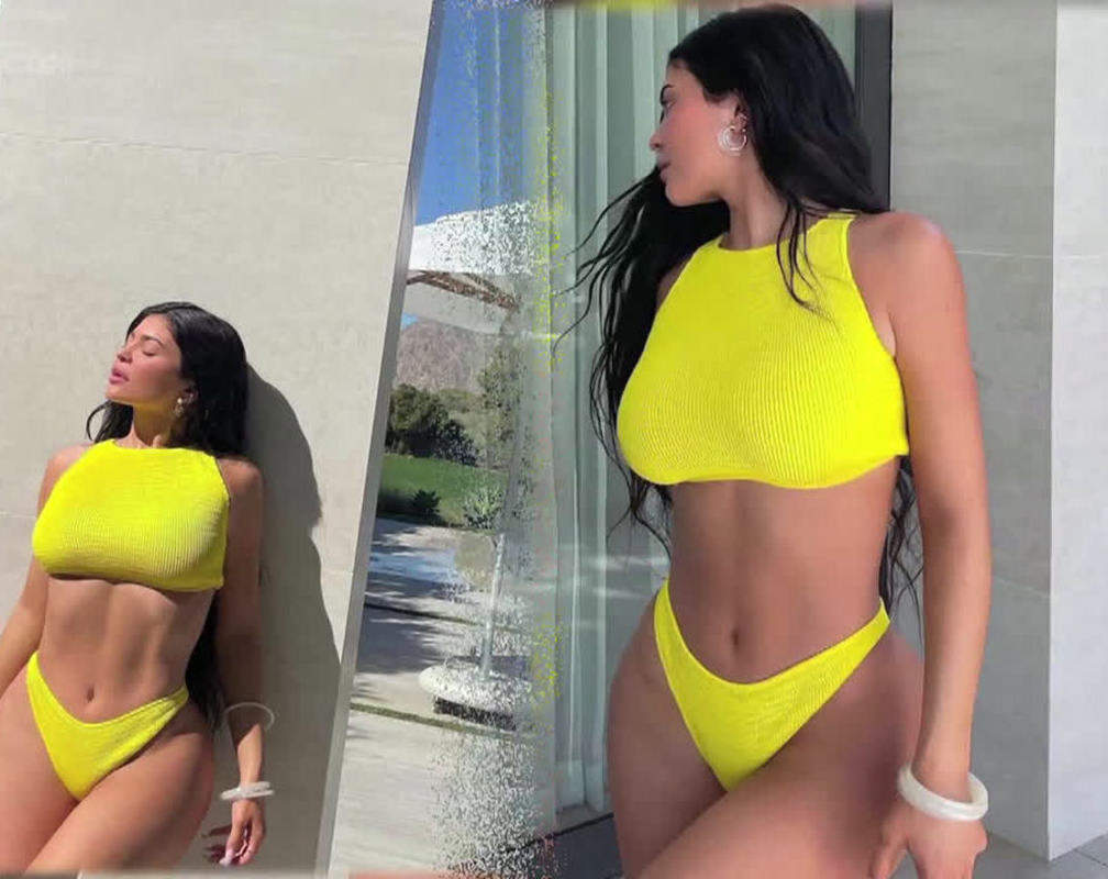 
Kylie Jenner flaunts her perfectly toned figure in yellow bikini
