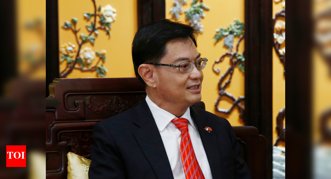 Singapore's designated future leader Heng Swee Keat steps aside