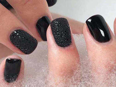 Get trendy and stylish with these black nail polishes