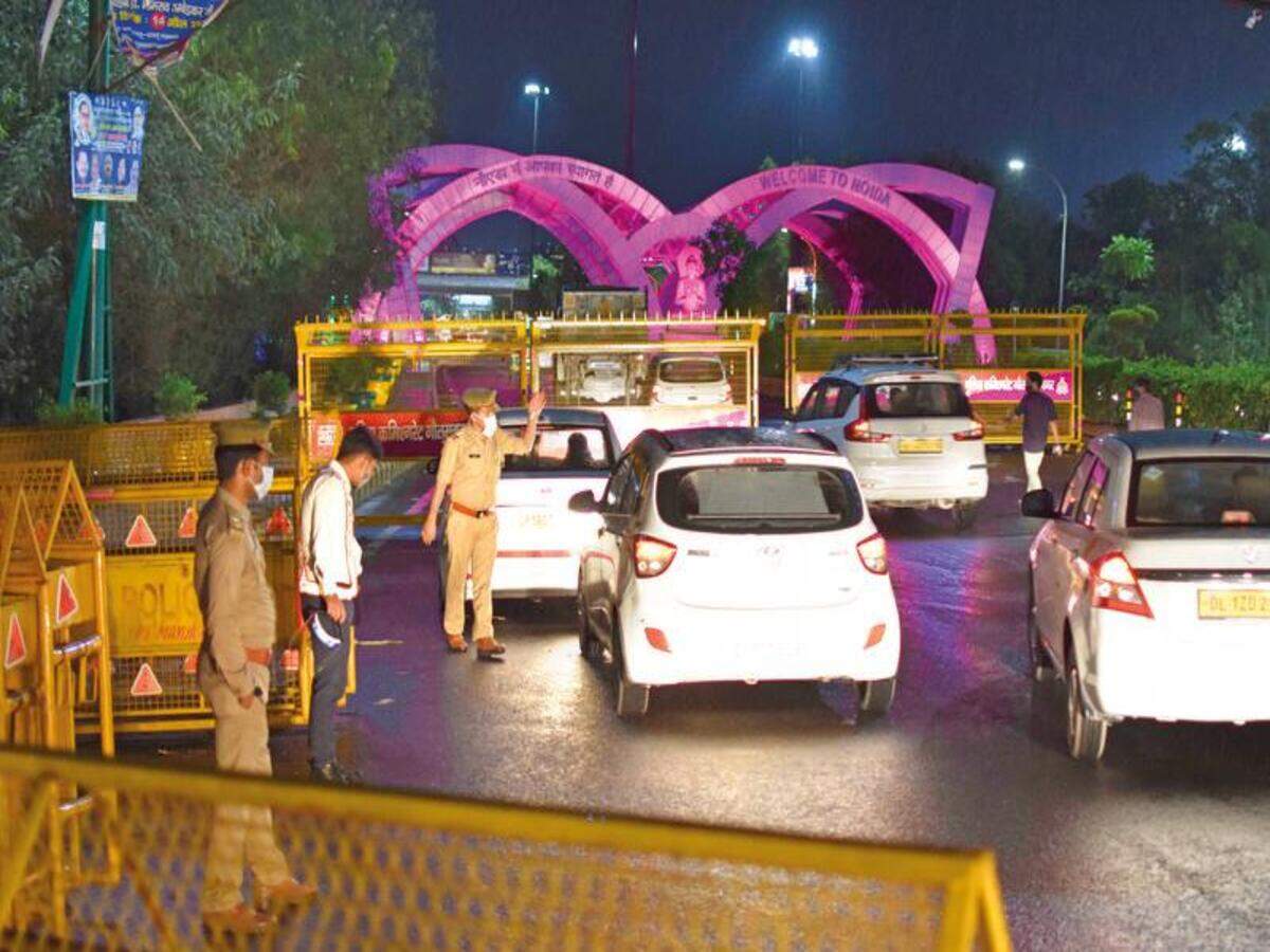 As cops check at border, line of vehicles grows | Noida News - Times of India