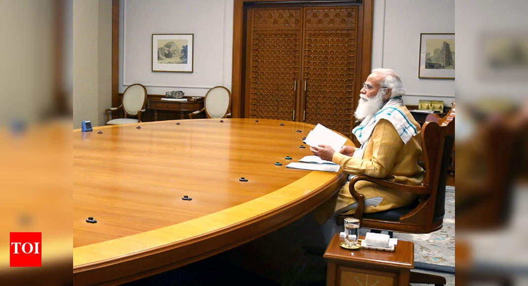 Covid-19: Need to ramp up vaccine production, ensure availability of beds, says PM Modi - Times of India