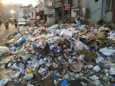 Overflowing garbage bins At Panjesha kali kaman