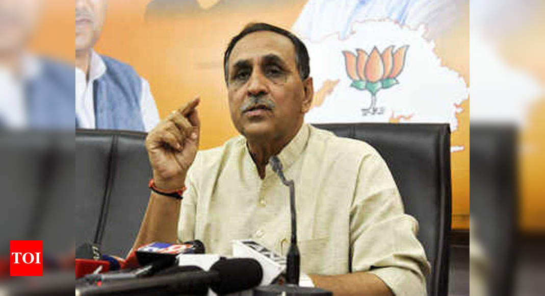 Adhering to guidelines of ICMR, not under-reporting Covid deaths: Gujarat CM | India News – Times of India