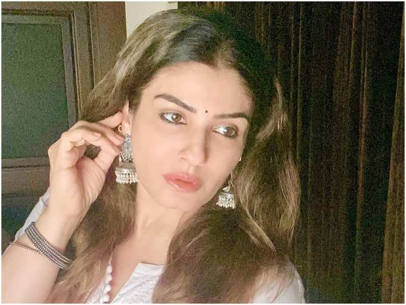 Raveena Tandon strikes a pose because she has nowhere to go and nothing to do