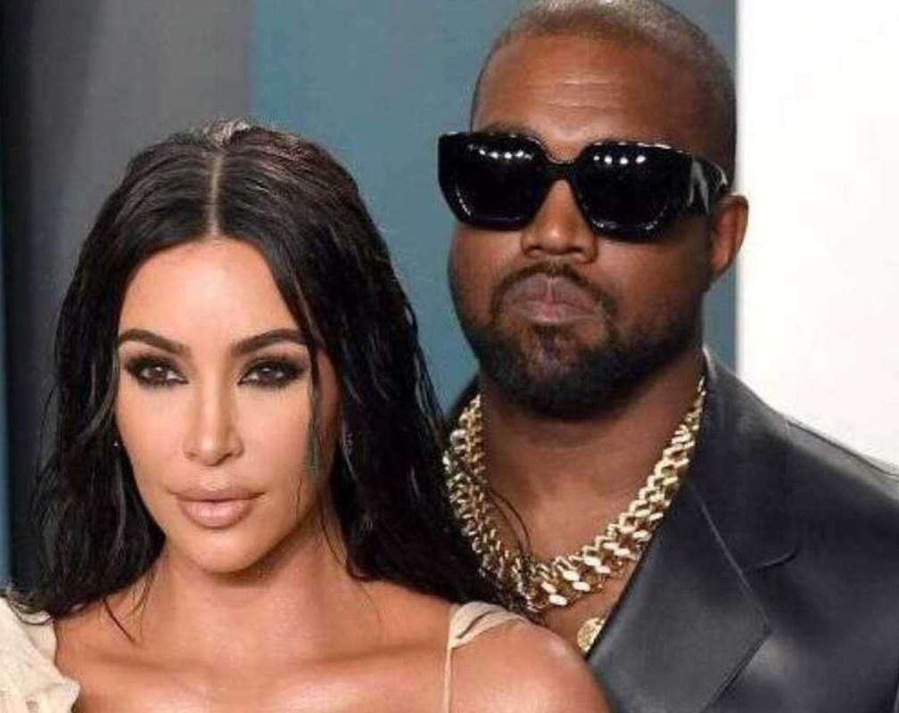 
Kim Kardashian feels happy that she and Kanye West have managed to keep 'things calm' as the duo heads for divorce

