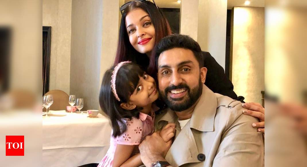 Aishwarya Rai Bachchan S Photo Throwback Tuesday When Aishwarya Rai Bachchan Abhishek And Aaradhya Cuddled Up For A Lovely Photo In London