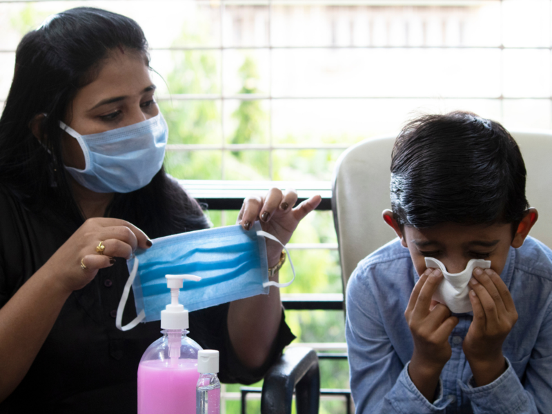 Coronavirus: How to keep your child safe if you test COVID positive - Times  of India