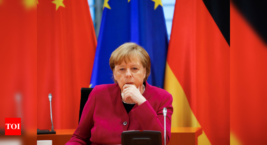 Germany's Angela Merkel presses China for human rights dialogue