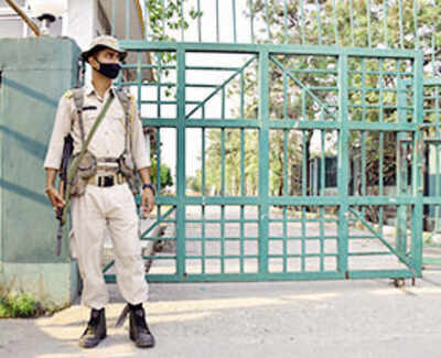 A security personnel stationed outside the strong room where EVMs have been kept, in Guwahati on Thursday