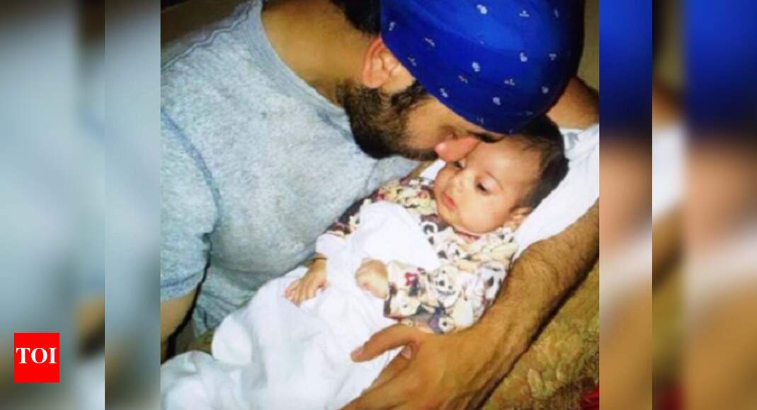 This picture of Ranbir Kapoor holding a baby is too cute to handle ...