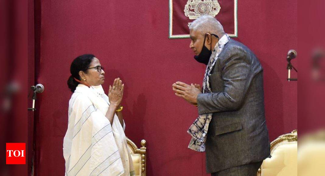 Mamata sworn in, says will ensure end to violence | India News – Times of India