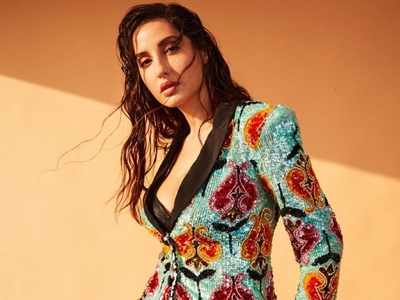PHOTOS: Nora Fatehi sets the temperature soaring with her sequined pantsuit look