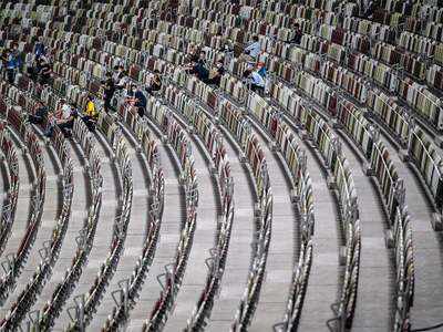 Fake cheers, empty seats: Tokyo gives glimpse of Covid-era Olympics