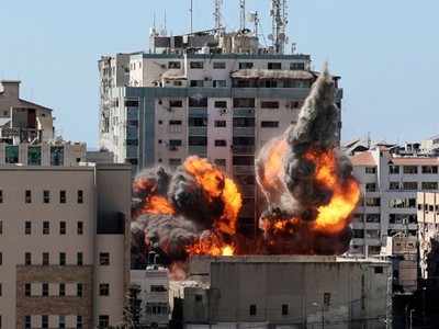 Israel flattens Gaza building hosting AP, Jazeera in air strike