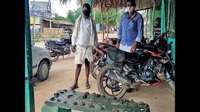 Grocers in Haveri village place cow dung cakes near shops to ensure social distancing