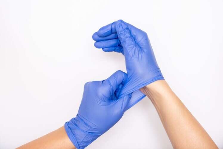 Disposable hand gloves