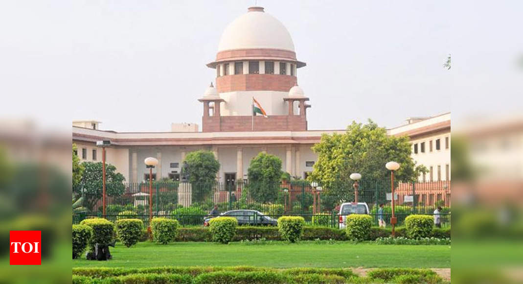 Supreme Court seeks Centre’s response on compensation to Covid victims’ kin | India News – Times of India