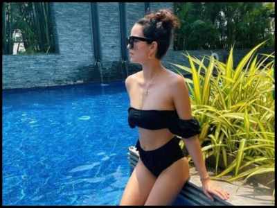 Natasa Stankovic heats up the cyberspace with a throwback pool picture; Hardik Pandya reacts