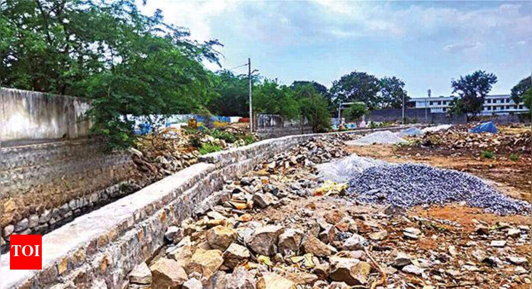 Wall comes up on nala of Kapra Lake Hyderabad News Times of India