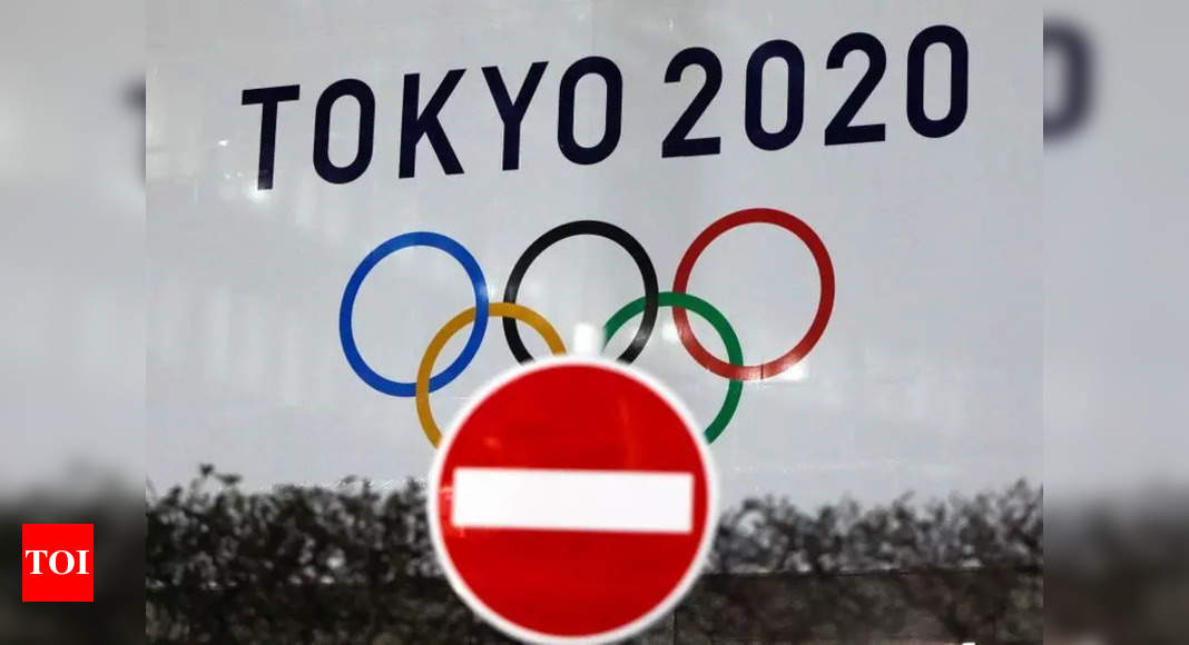 Japan to extend virus emergency until month before Olympics