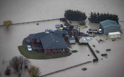 'Once-in-a-100-year' rain, floods continue in New Zealand
