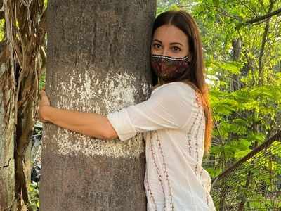 Mom-to-be Dia Mirza hugs a tree in her latest social media post, ahead of World Environment day