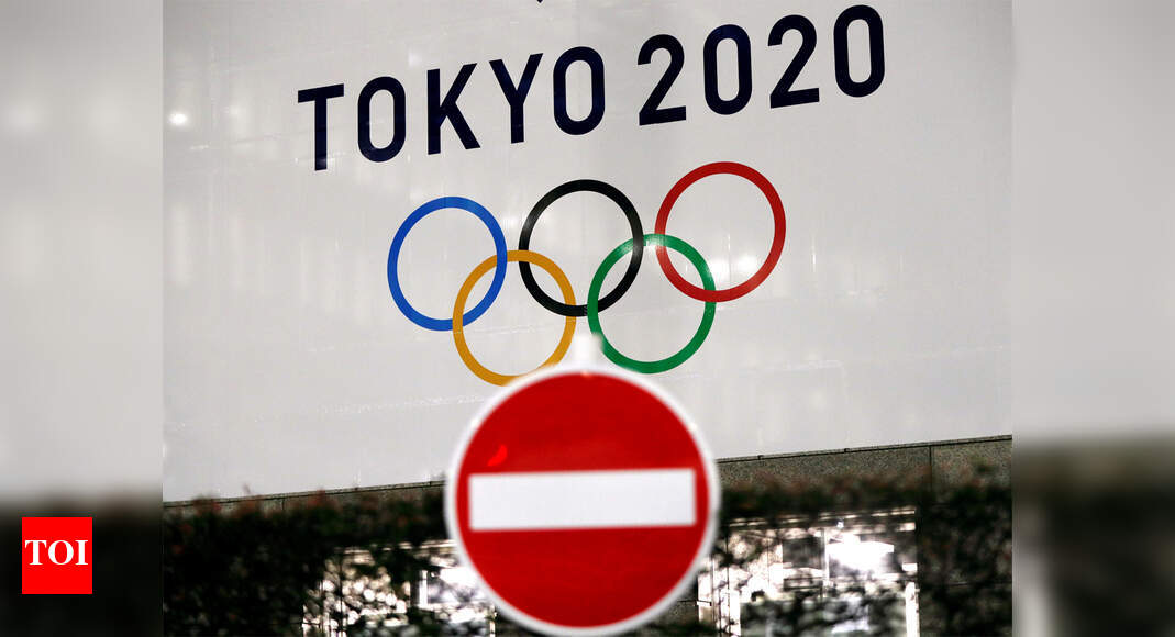 Tokyo Olympics chief says cancellation unlikely as 10,000 volunteers