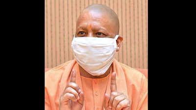 Thwart third Covid wave with sanitisation, fogging: UP CM Yogi Adityanath