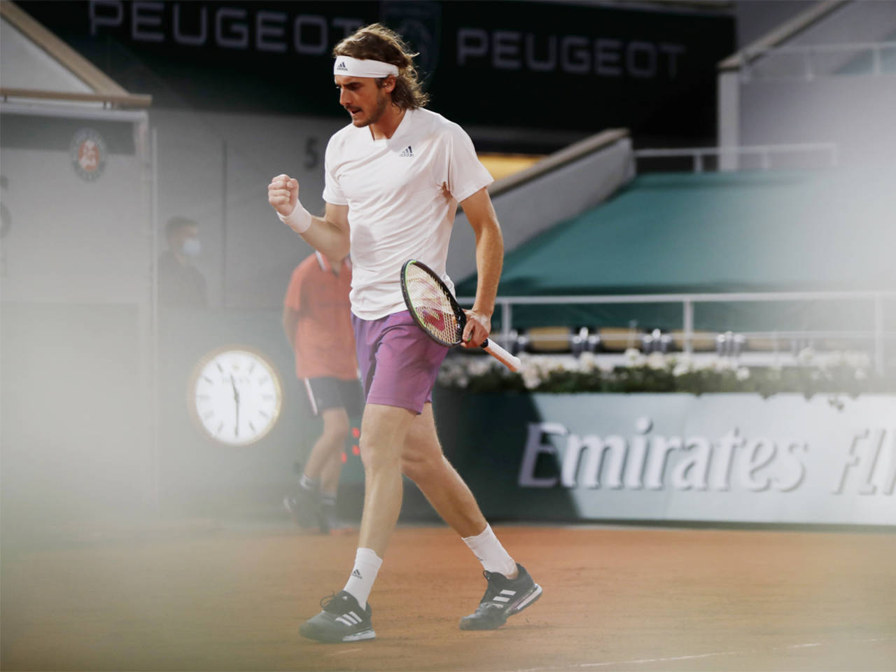 French Open 2021 Steely Stefanos Tsitsipas keeps his cool to beat John Isner in four sets Tennis News