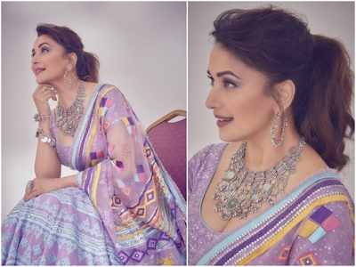 Pics: Madhuri Dixit is a sight to behold in a purple lehenga