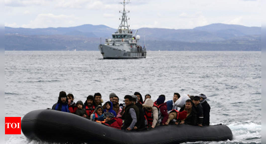Greece says many migrants in Turkey could seek asylum there – Times of India