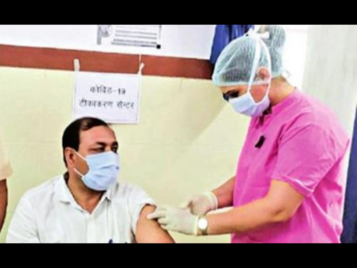 A nurse administers a vaccine at a health centre in the city on Tuesday.