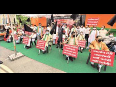 BJP leaders protest at party headquarters in the city on Tuesday.