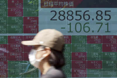 Tokyo shares end lower, investors seek subdued US trade