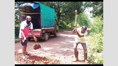 Two youth begin to repair neglected road in Netravali Goa