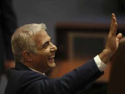 Israel's Lapid: From TV anchor to coalition architect