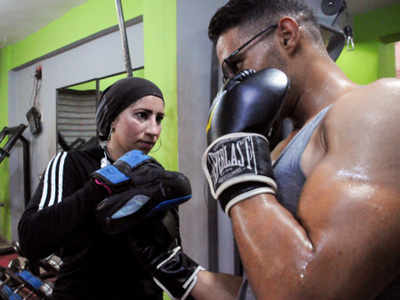 Woman trains men to box in Egyptian agricultural heartland