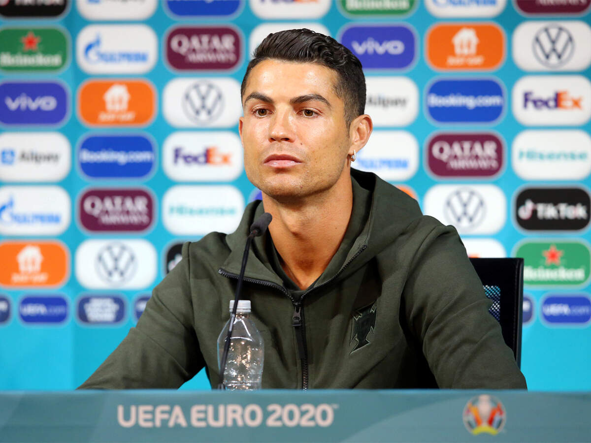 Drink water': Cristiano Ronaldo removes Coca Cola bottles at Euro press conference | Football News - Times of India