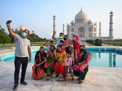 Taj Mahal reopens after 3 months, 650 tourists will be allowed at a time |  Agra News - Times of India