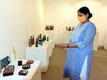 Art lovers attend an exhibition on bottle art and freehand mandalas