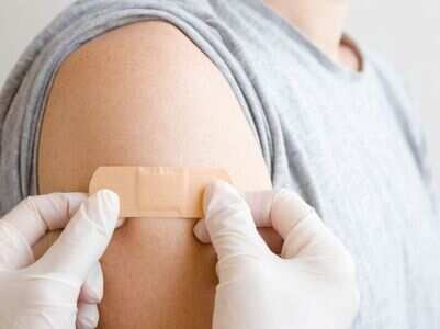 What causes a sore arm post COVID vaccination?