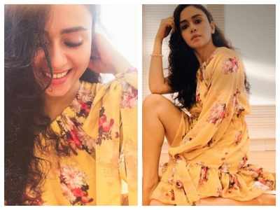 Photo Alert! Amruta Khanvilkar looks pretty as poses in a stunning yellow outfit
