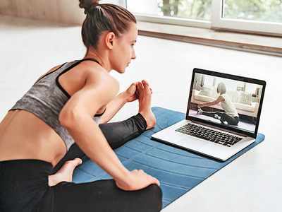 Gym junkies trade in dumbbells for yoga mats amid pandemic - Times of India