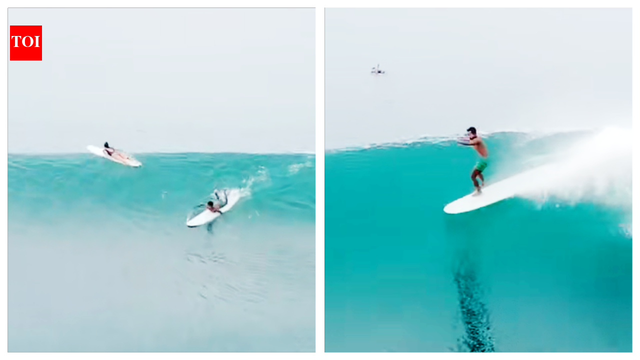 Vacation goals: Surfer catches the perfect wave!