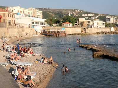 As Lebanon battles crisis, it's coastal city of Batroun thrives on local tourism