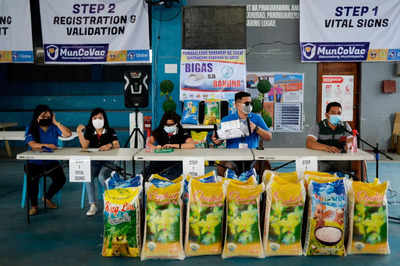 Philippines community raffles off bags of rice to boost vaccine drive
