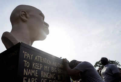 Neo-Nazi group name scrawled on New York George Floyd statue
