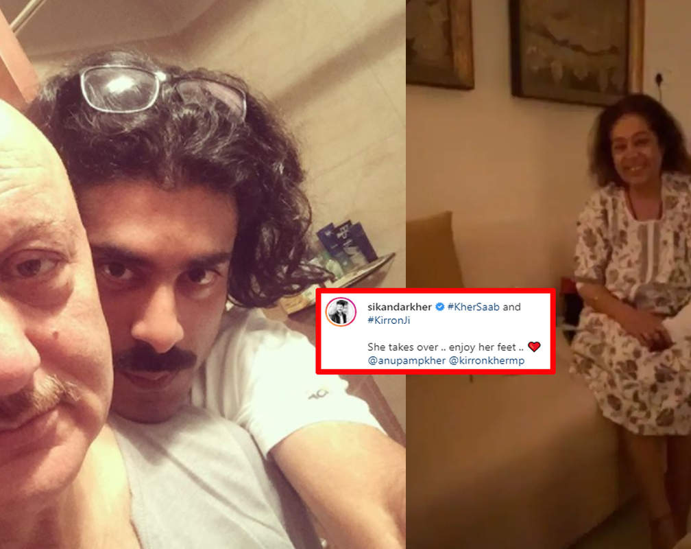 
Kirron Kher refuses to show her face in this latest video of son Sikandar Kher, watch their funny banter with Anupam Kher
