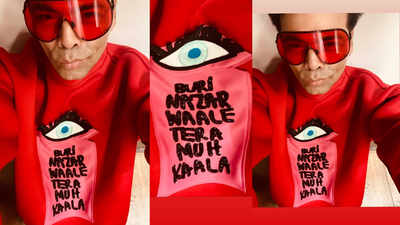 Karan Johar takes sly dig at trolls, wears a sweatshirt that says 'Buri nazar waale, tera muh kaala'