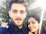 Soon-to-be-mommy Freida Pinto flaunts her baby bump in new pictures with her fiancé